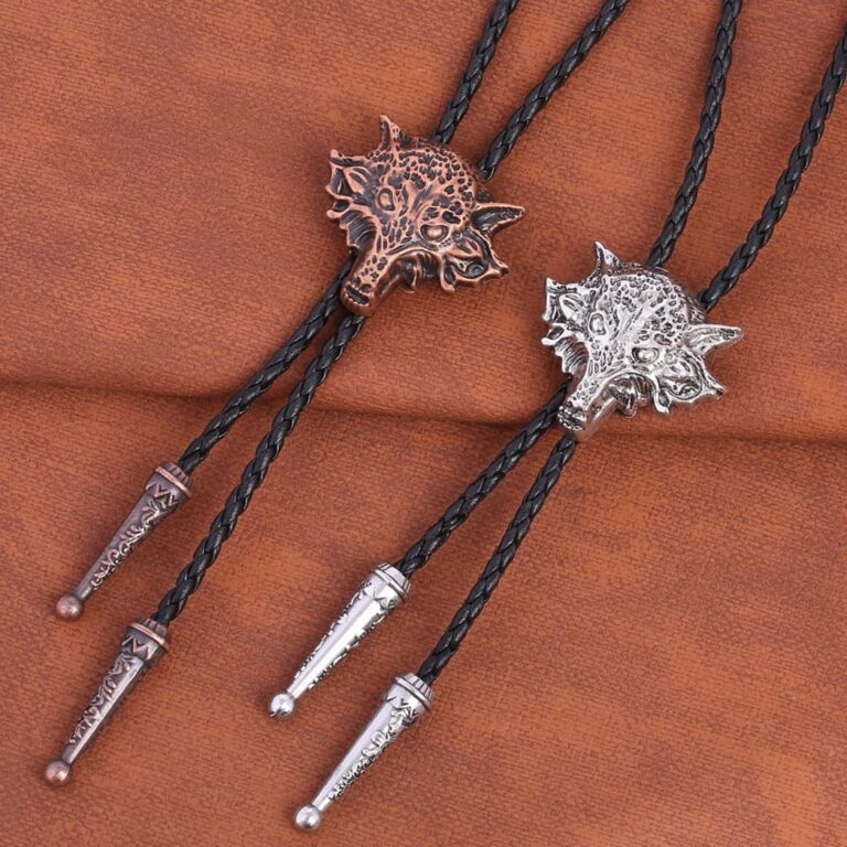 Fierce Engraved Wolf Head Bolo Tie With Black Leather Bootlace Cords and Intricate Detailing
