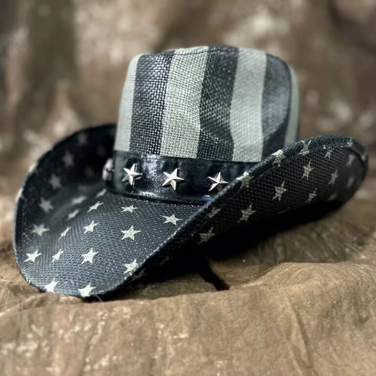 Black and white American flag pattern straw cowboy hat with star-studded leather band and curved brim