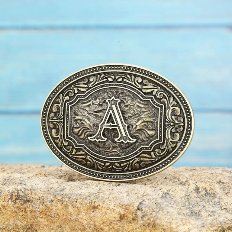 Antique-style personalized Western scroll belt buckle with custom engraved initials in an ornate design